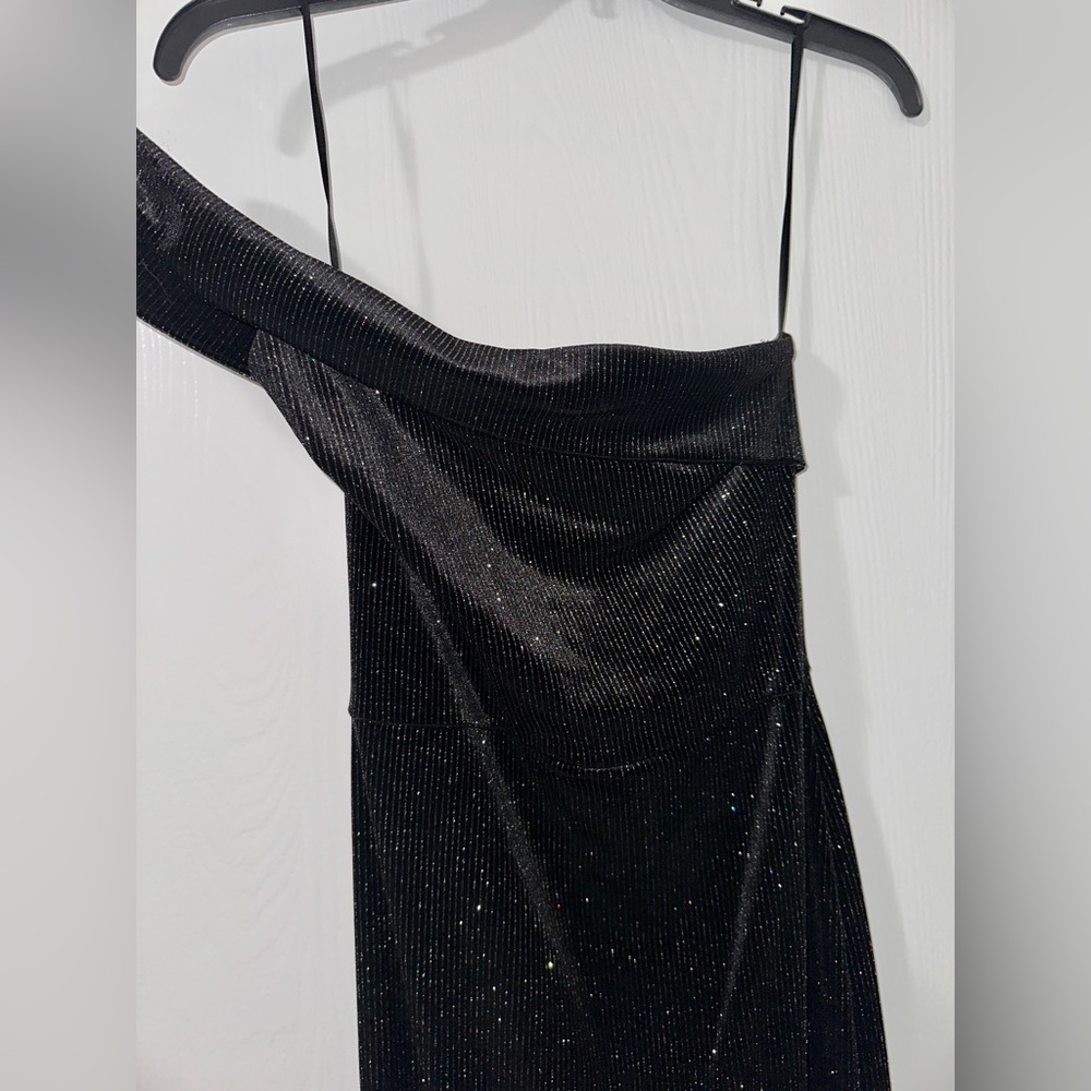 Black velvet gown one shoulder gown with sparkles.